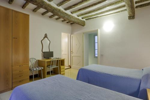 Tempat tidur dalam kamar di Attilio Camere