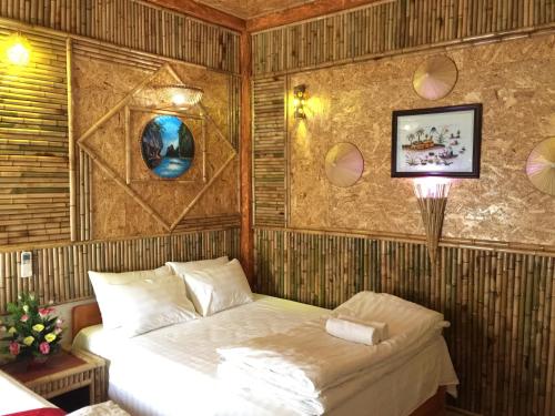 Giường trong phòng chung tại Tam Coc Vinh Thinh Homestay