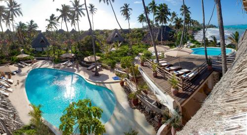 an aerial view of a pool at a resort at SeVi Boutique Hotel in Matemwe