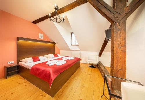 Postel nebo postele na pokoji v ubytování Hotel U Martina