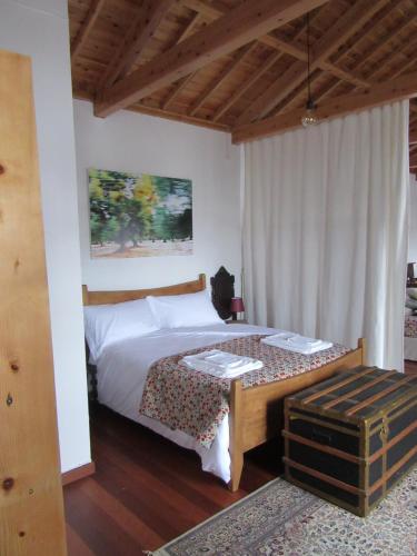 Ein Bett oder Betten in einem Zimmer der Unterkunft O Antigo Lagar