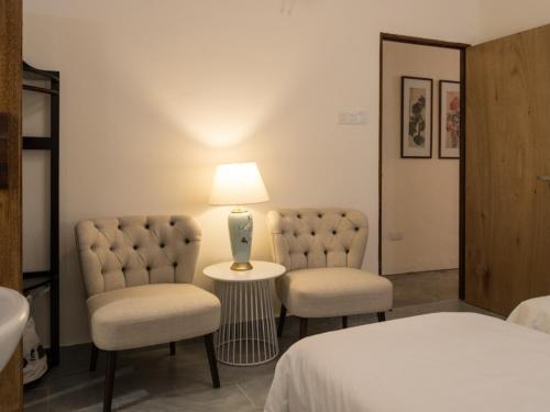 Ένα ή περισσότερα κρεβάτια σε δωμάτιο στο Carnarvon House