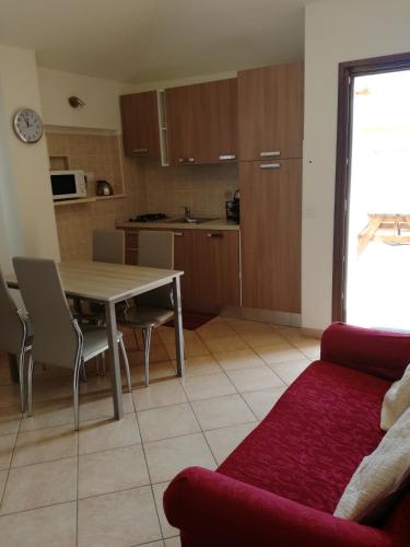 Kuchyň nebo kuchyňský kout v ubytování Apartment Altomare