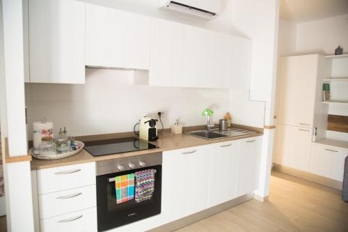 Cucina o angolo cottura di Terramata Resort Case Vacanza