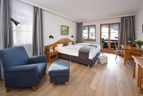 เตียงในห้องที่ Concordia Vitalhotel & SPA