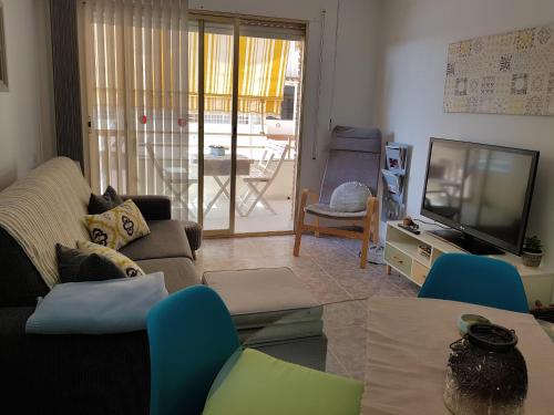 A television and/or entertainment centre at Residencial Colibrí