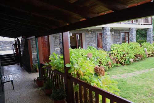 a balcony of a house with plants on it at Casa D'Avo Beatriz in Gaula