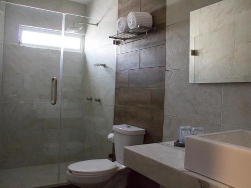 Koupelna v ubytování Hotel Corral Grande