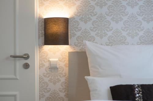 Katil atau katil-katil dalam bilik di List Five - Your British Guesthouse