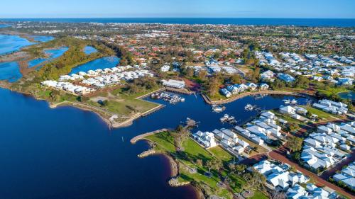 an aerial view of a marina on a lake at Mandurah Quay Resort in Mandurah