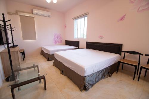 Silver Blue B&B 待月民宿台東縣民宿登記第1489號にあるベッド