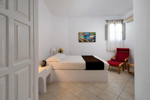 Ένα ή περισσότερα κρεβάτια σε δωμάτιο στο Gorgona Villas 
