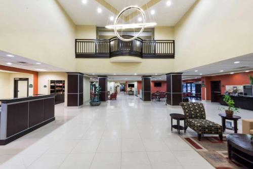 a lobby of a hospital with a waiting room at Wingate by Wyndham Lake Charles Casino Area in Lake Charles