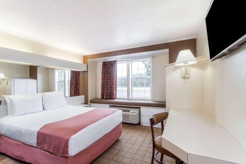 Postel nebo postele na pokoji v ubytování Microtel Inn by Wyndham Wilson
