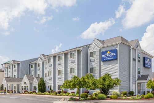 a rendering of the exterior of amg hotel at Microtel Inn and Suites Elkhart in Elkhart