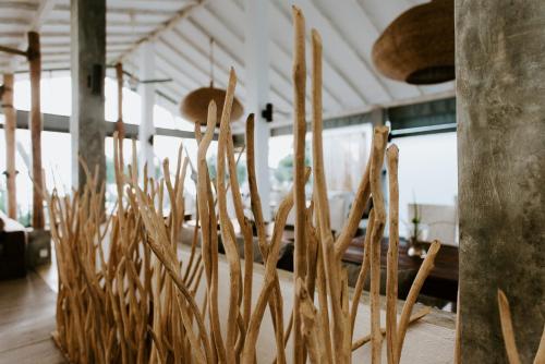 a bunch of sticks on the floor of a room at Vanina Villas in Matara