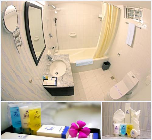 uma casa de banho com um lavatório, WC e um espelho. em Asia Hotel & Resorts em Daca