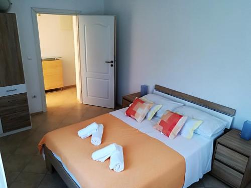 Posteľ alebo postele v izbe v ubytovaní Apartman Rosanda 1