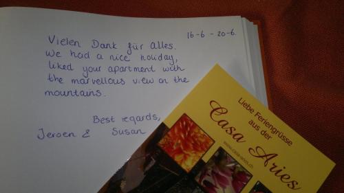 a piece of paper with a handwritten note on it at Casa Aries & Studio Aurora, Cavigliano in Cavigliano