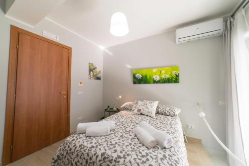 Posteľ alebo postele v izbe v ubytovaní B&B MaLò Family Friendly