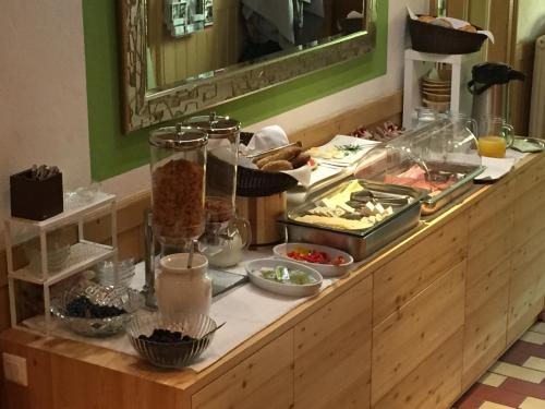 a buffet with a lot of food on a counter at Rettensteinerhof Wirtshaus in Hollenstein an der Ybbs