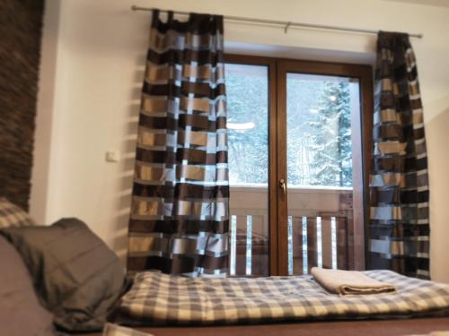 Posteľ alebo postele v izbe v ubytovaní Romantic Chopok Juh Apartment 22