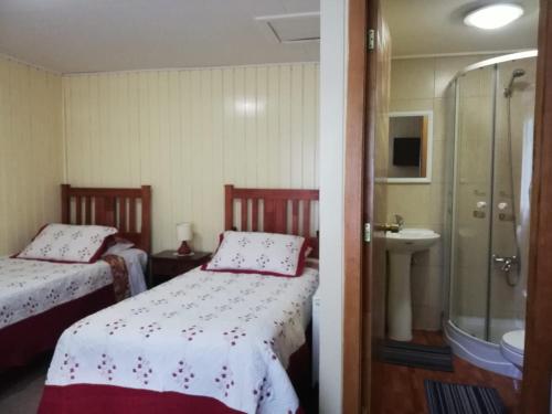 Postel nebo postele na pokoji v ubytování Hostal El mirador 2