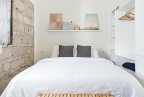 Postel nebo postele na pokoji v ubytování Sherryflat Bodega San Blas