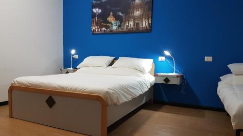 Cama ou camas em um quarto em La Casa del Viaggiatore