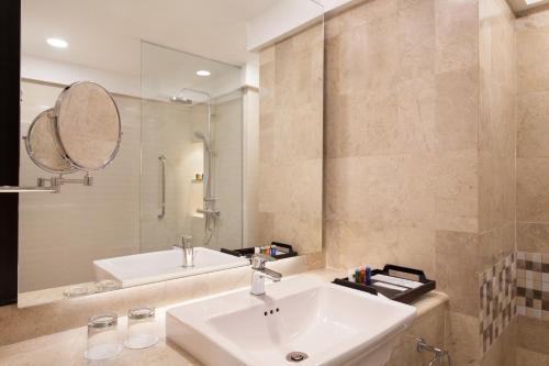Koupelna v ubytování AIHO Hotel Medan