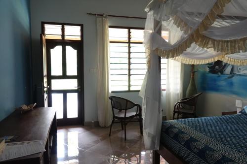Katil atau katil-katil dalam bilik di Residence Maison Müge