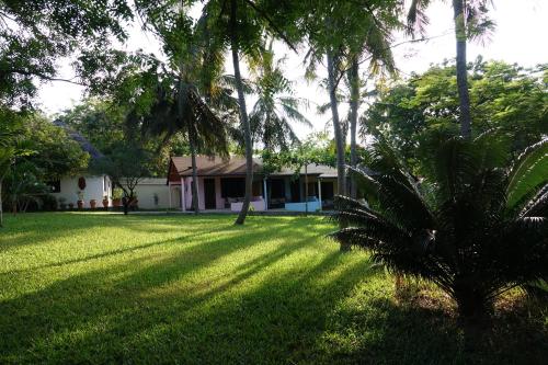 Taman di luar Residence Maison Müge