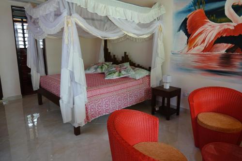 Katil atau katil-katil dalam bilik di Residence Maison Müge