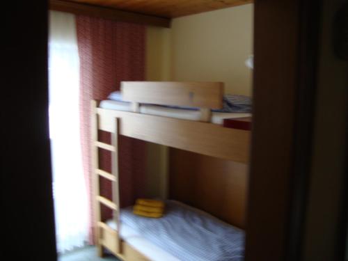 Una cama o camas cuchetas en una habitación  de Haus Ottilie