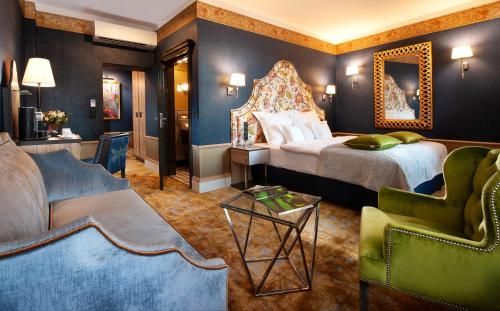 Posteľ alebo postele v izbe v ubytovaní Balthazar Design Hotel