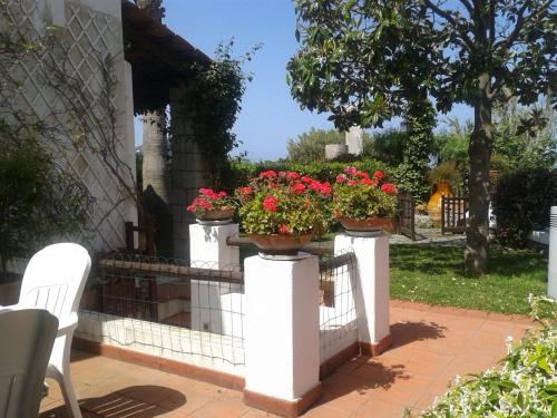 Κήπος έξω από το Villa Moma giardino, tennis e piscina panoramica