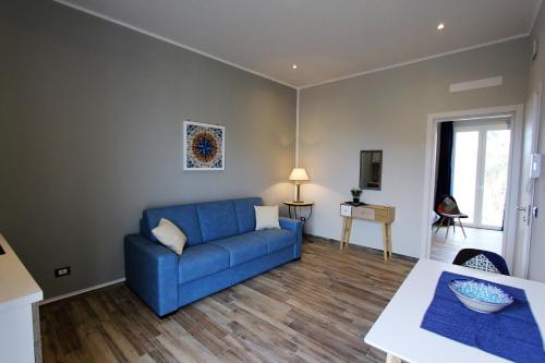 A seating area at Case Vacanza Le Casette