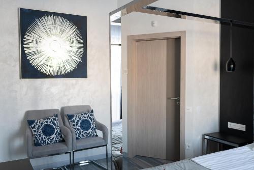 Кровать или кровати в номере Chalet BFamilyHouse Bukovel