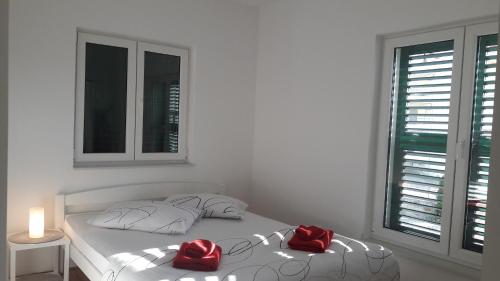 Postel nebo postele na pokoji v ubytování Apartment AnaKatarina