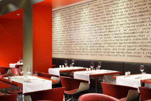 UNA Hotels Bologna Centroにあるレストランまたは飲食店