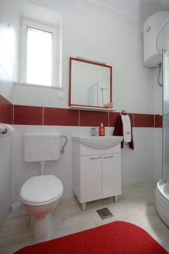 Vonios kambarys apgyvendinimo įstaigoje Apartments Eldin