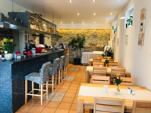 Kuchyň nebo kuchyňský kout v ubytování Hotel Discovery