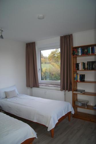 A bed or beds in a room at Ferienwohnung E. und E. Walter