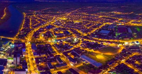 an aerial view of a city at night at Stan na dan Gradiška/Bos. Gradiška in Bosanska Gradiška