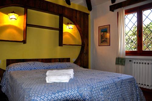 Krevet ili kreveti u jedinici u okviru objekta Villa Rosè - Baja Sardinia
