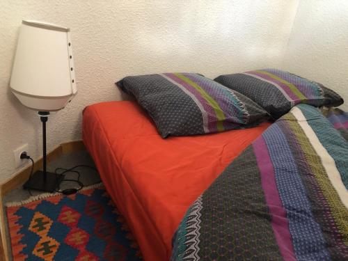 Postel nebo postele na pokoji v ubytování Le ZEN avec piscine chauffée en extérieur