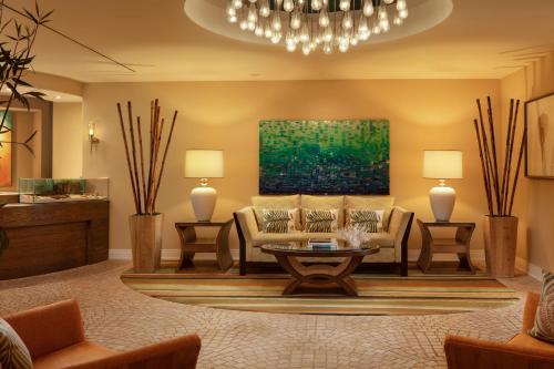 a living room filled with furniture and decor at Hyatt Residence Club Sarasota, Siesta Key Beach in Sarasota