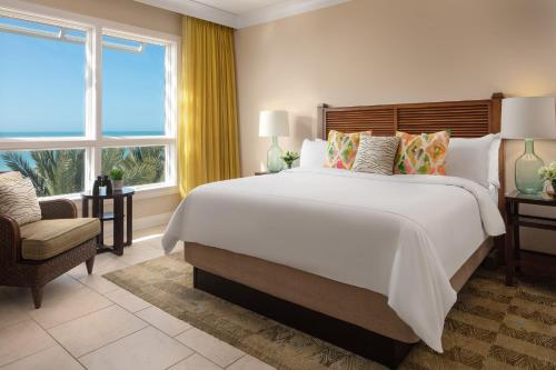 Säng eller sängar i ett rum på The Residences on Siesta Key Beach by Hyatt Vacation Club