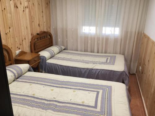 A bed or beds in a room at Casa Leycar