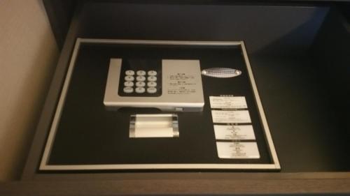 a picture of a remote control in a box at Takamatsu Tokyu REI Hotel in Takamatsu